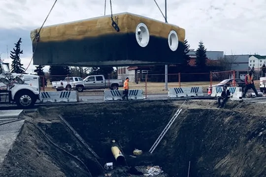 On-site installation support lowering equipment into a chamber