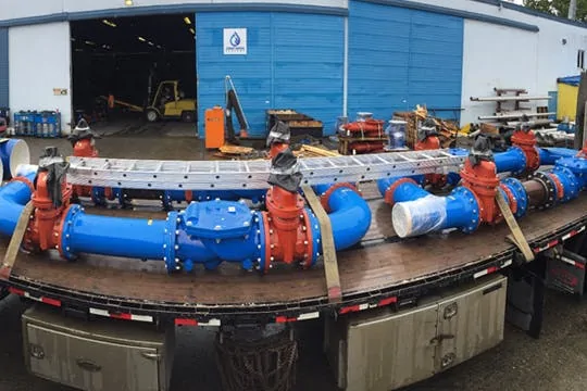 Pre-packaged meter chamber with blue manifold piping